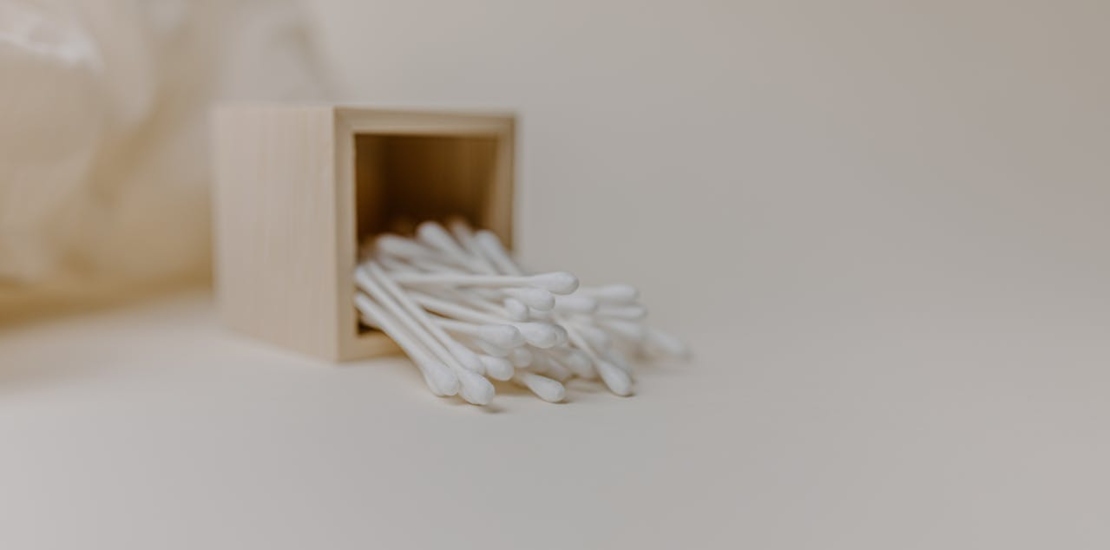 cotton swabs on a white surface