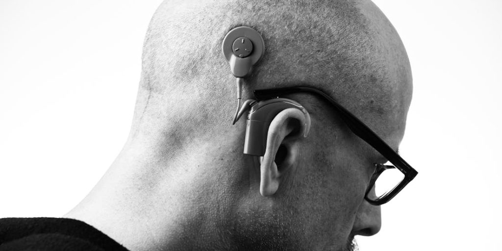 A person with a hearing aid