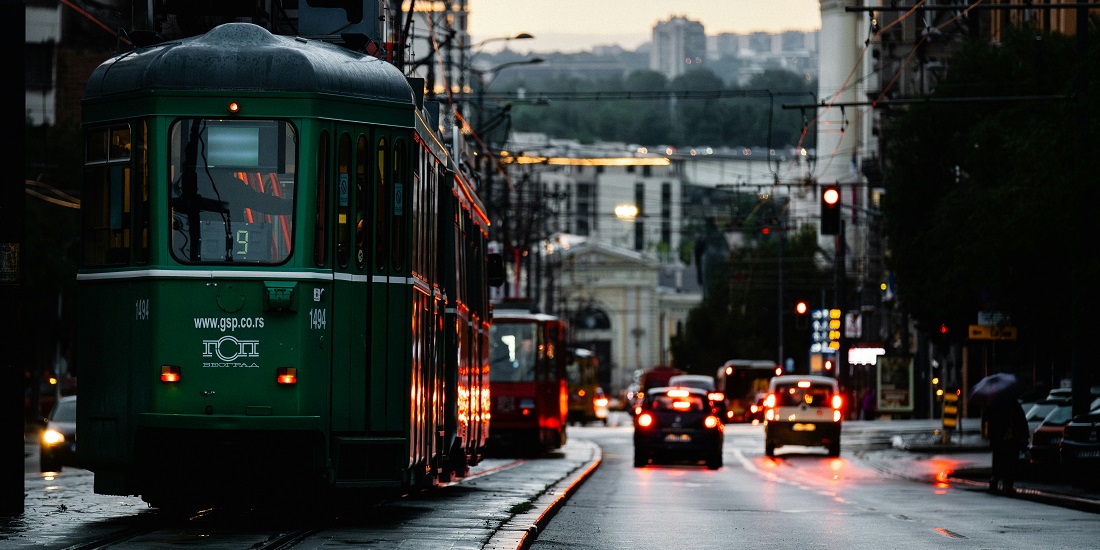 The night tram and cars create noise pollution in the city center.